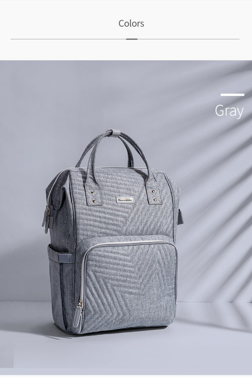 Sac à dos à langer matelassé moderne