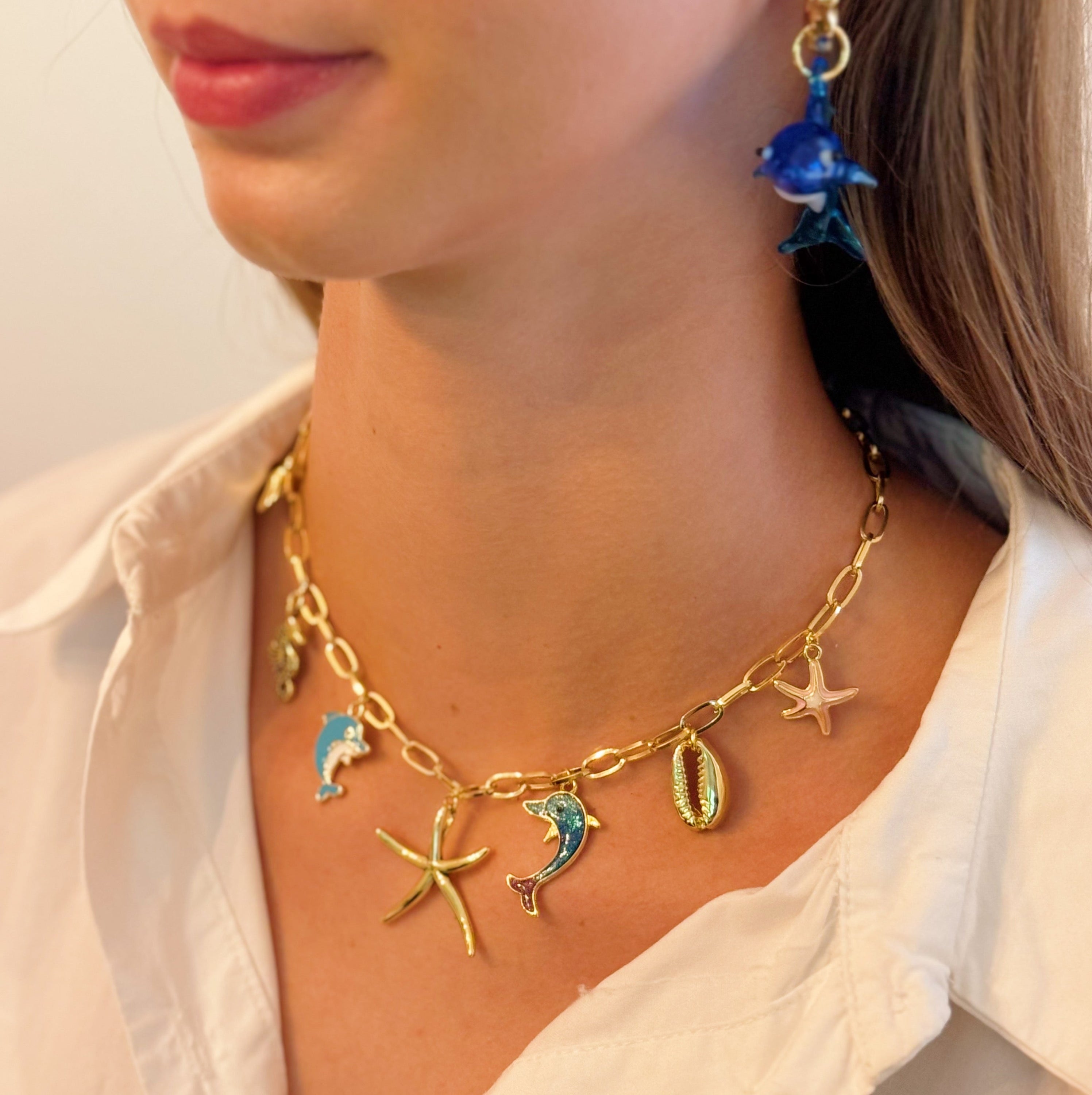 Collier Charm Océan – Dauphin, Étoile de Mer & Coquillage