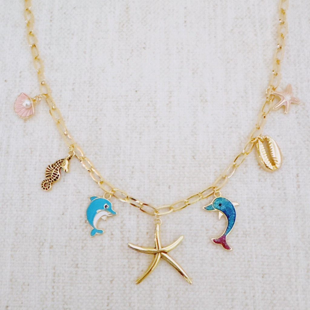 Collier Charm Océan – Dauphin, Étoile de Mer & Coquillage