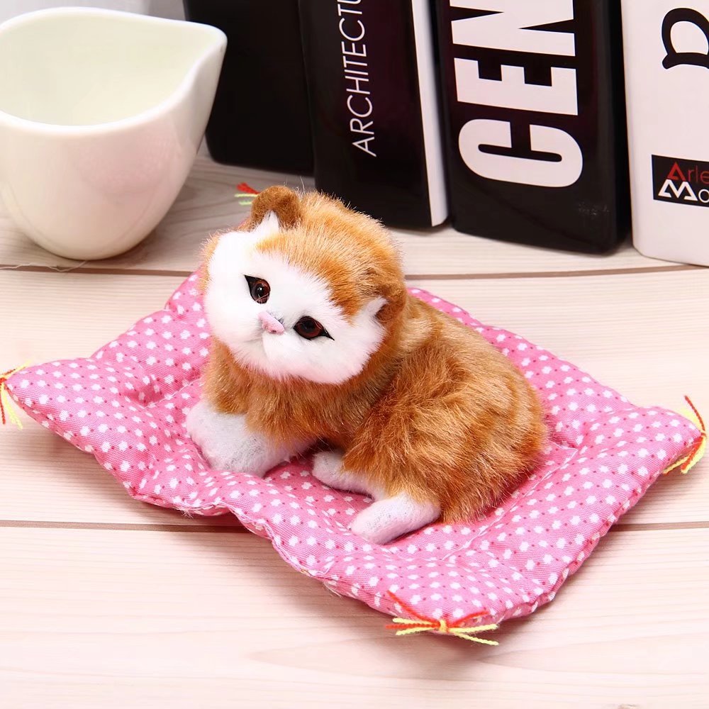 Jouet artisanal pour chat dormant avec son
